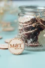 Close-up detail of rustic charm drink tokens