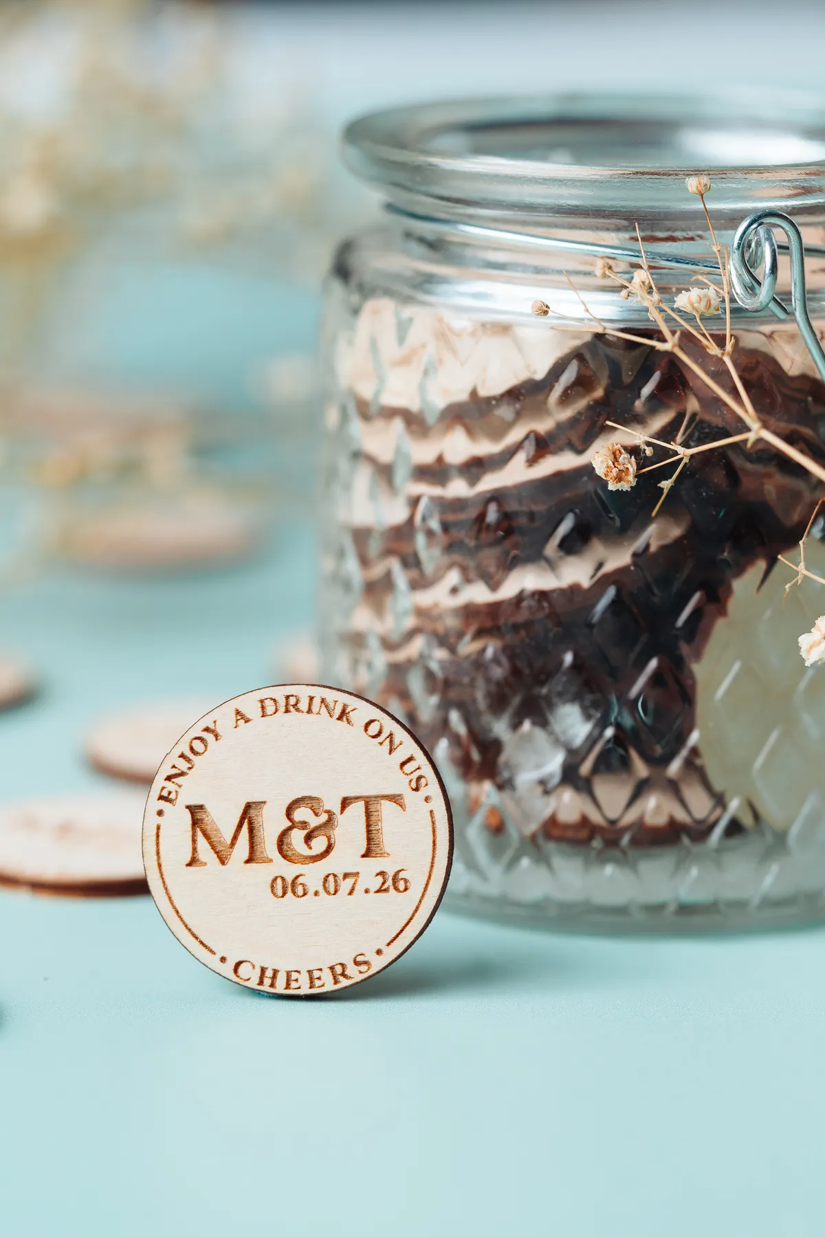 Close-up detail of rustic charm drink tokens
