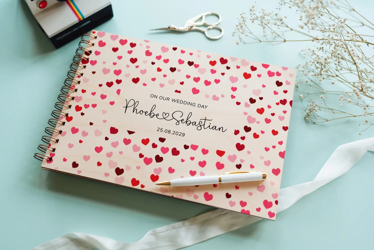 confetti hearts wedding guest book open showing thick 160gsm white pages for guest messages