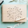 Cupid's Arrow & Love Heart Guest Book 2 Customer review photo showing personalised Cupid's arrow wooden wedding guest book from CluckingBelle