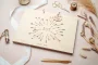 Cupid's Arrow Wedding Guest Book styled on a wedding welcome table