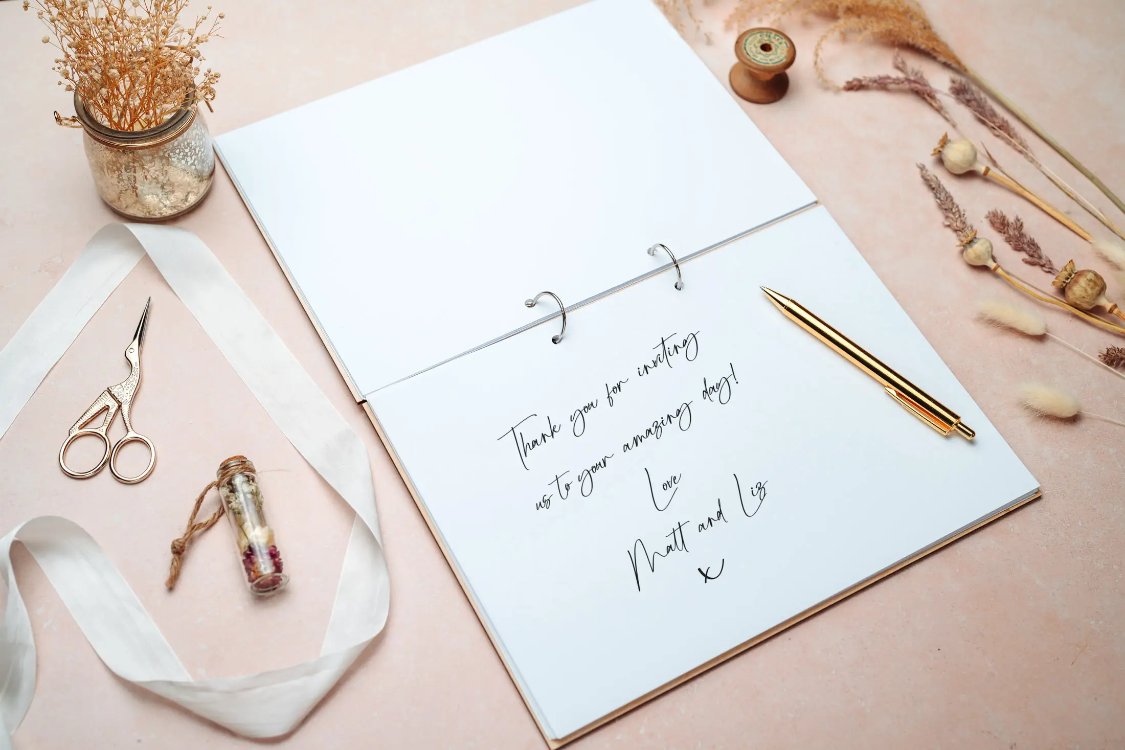 Laser-engraved wooden cover of the clean & contemporary guest book