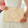 Spiral-bound personalised wooden wedding guest book thumbnail showing engraved birch wood cover