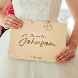 Personalised spiral-bound wooden wedding guest book with wildflower engraving handmade in Norfolk UK