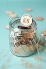 Personalised cash value wooden wedding drink tokens with engraved pound sign design made in Norwich UK