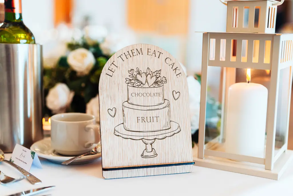 Alternative view of the cake flavours wedding sign