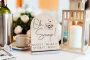 Oh Snap! Photo Guestbook Sign 9 Oh Snap! Photo Guestbook Sign styled with floral decorations at a wedding