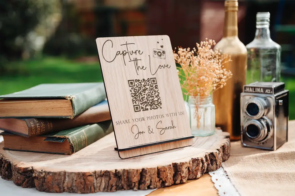 Close-up detail of the capture the love qr code sign engraving
