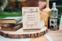 Close-up detail of the snap it shake it stick it sign it engraving