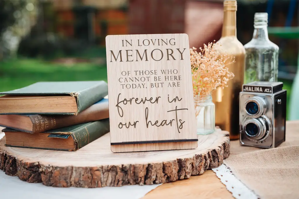 Laser-engraved oak in loving memory wedding sign with natural wood grain