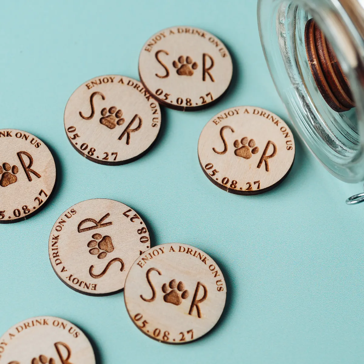 Paw Print Drink Tokens 1 Personalised paw print wooden wedding drink tokens for pet-themed weddings laser-engraved in Norwich