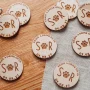 Paw Print Drink Tokens 5 Close-up detail of paw print drink tokens