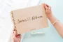 Boho Love Heart Wedding Guest Book open showing the lined interior pages