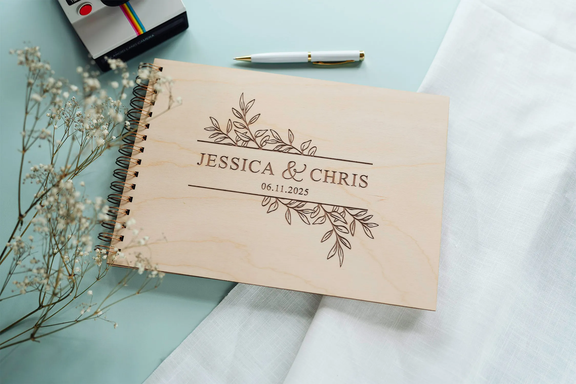 Spiral-Guestbooks-25.webp Personalised floral spiral-bound wedding guest book with couple's names and date
