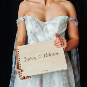 Spiral-bound wedding guest books with personalised engraved plywood covers
