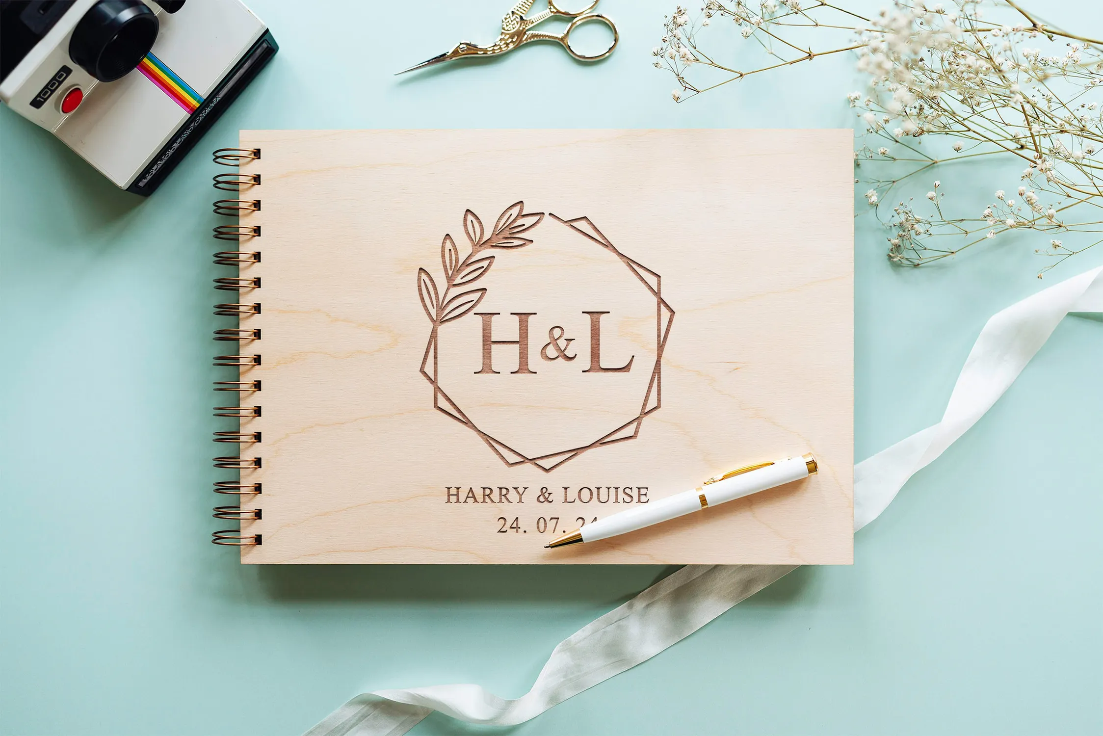 Spiral-Guestbooks-75.webp Laser-engraved wooden cover of the monogram wedding guest book