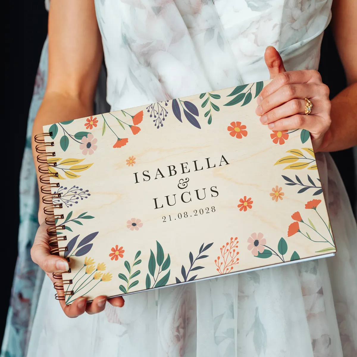 Bold botanical UV colour-printed wooden wedding guest book square cover close-up showing floral botanical design