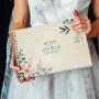 floral engraved wedding guest book open showing thick 160gsm white pages for guest messages