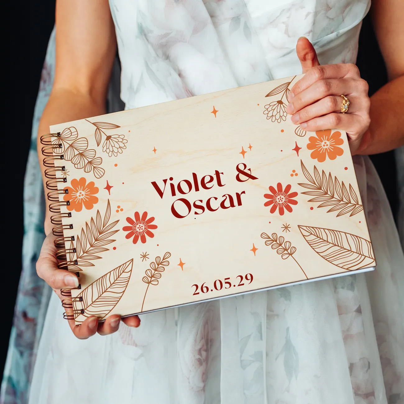 personalised autumn boho wedding guest book cover detail with laser-engraved floral design
