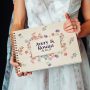 Wildflower border wedding guest book square UV-printed cover close-up with vibrant colour floral border design