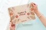 autumn boho personalised wooden wedding guest book with spiral wire binding and personalised wooden cover