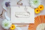 Close-up of the floral wedding guest book engraved cover detail
