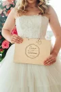 Close-up of the modern geometric wedding guest book engraved cover detail