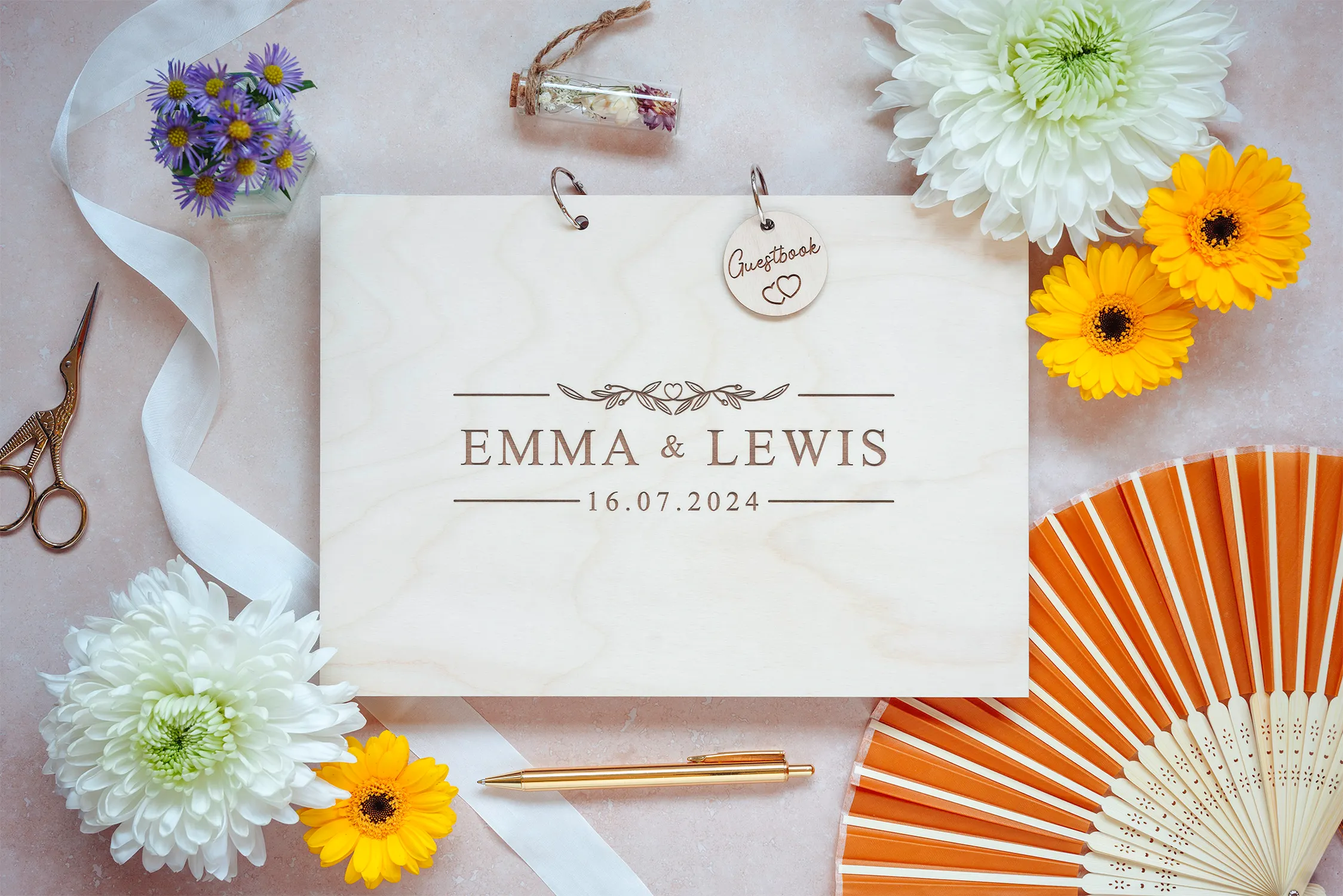Close-up of the modern alternative wedding guest book engraved cover detail