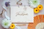 Close-up of the photo booth wedding guest book engraved cover detail