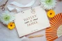 Laser-engraved wooden cover of the contemporary minimal wedding guest book