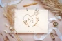 Laser-engraved wooden cover of the bespoke wedding guest book