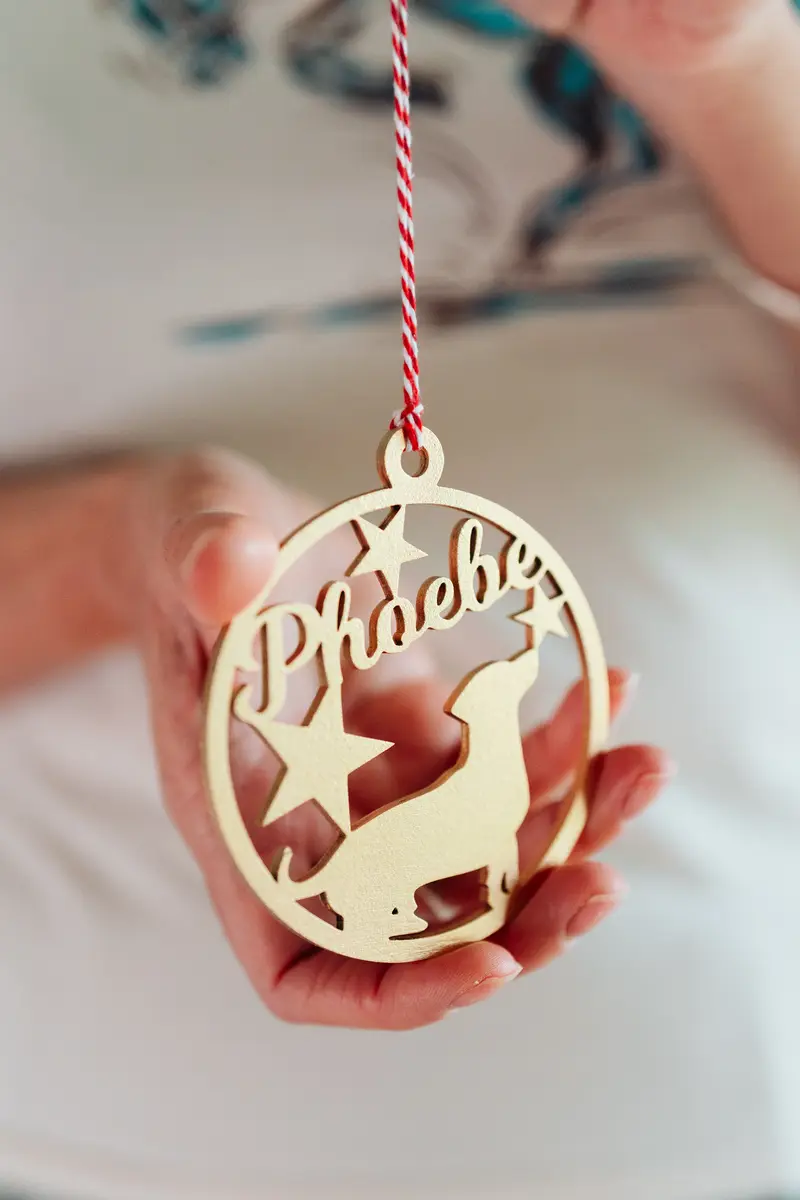 Personalised Pet Bauble shown with festive decorations