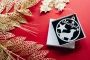 Laser-engraved wooden personalised pet bauble with ribbon
